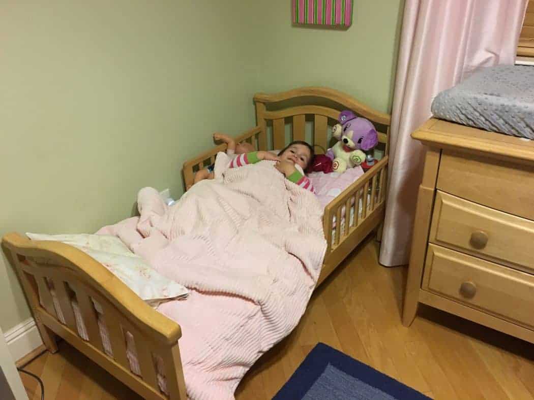 Toddler in a toddler bed.