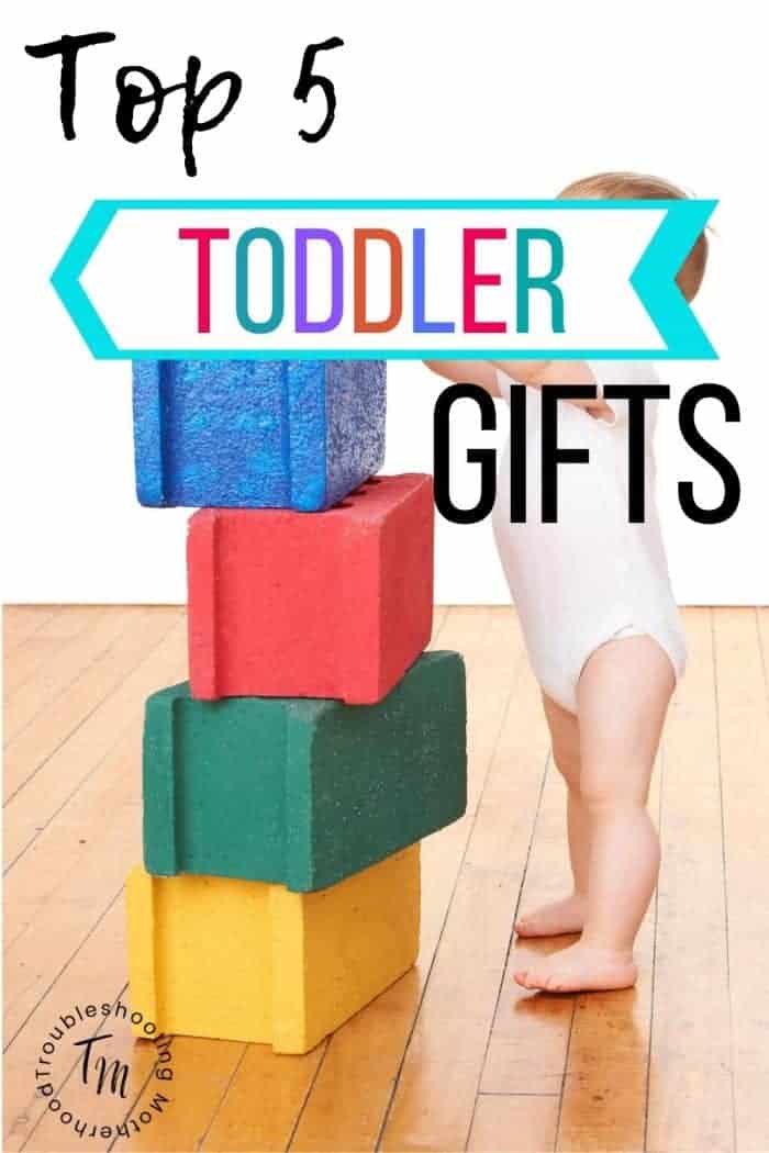 Top toddler gifts, toddler playing with foam blocks.