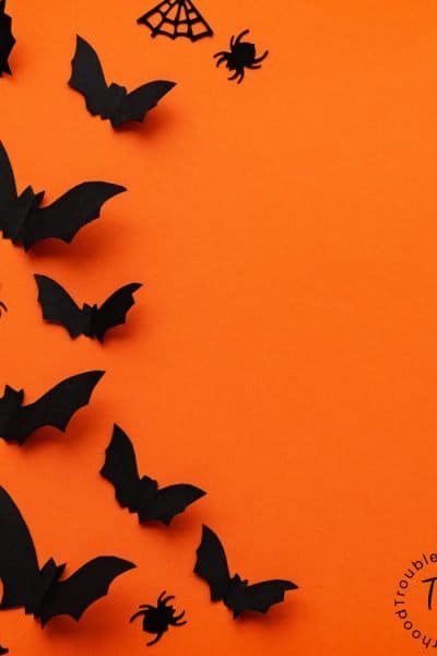 Orange background with bats