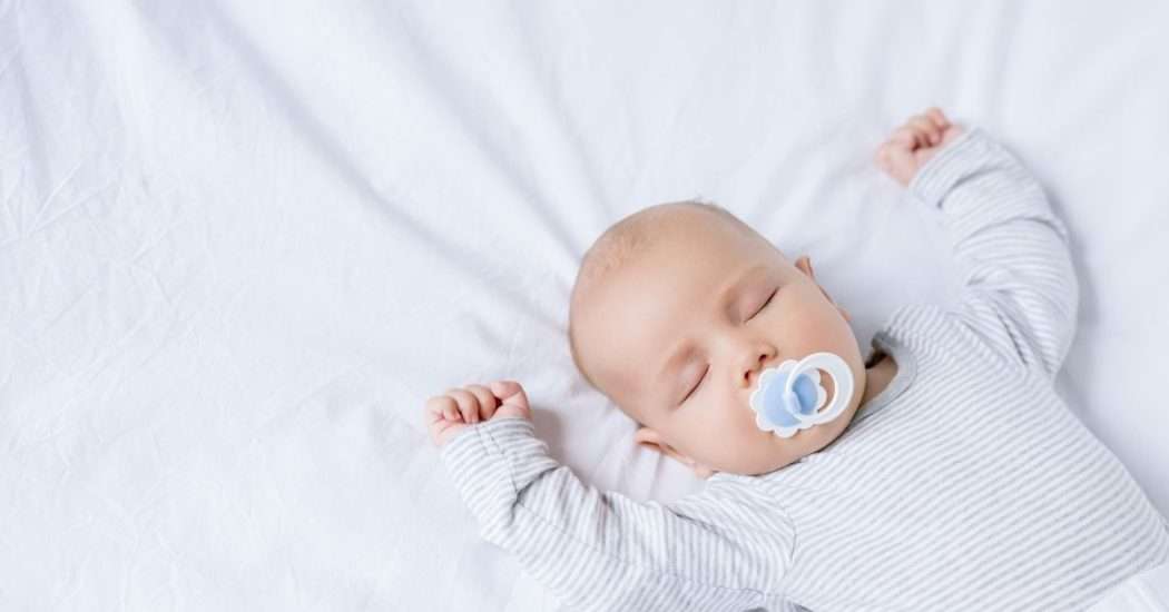 baby sleeping on his back. The best portable baby bed. 
