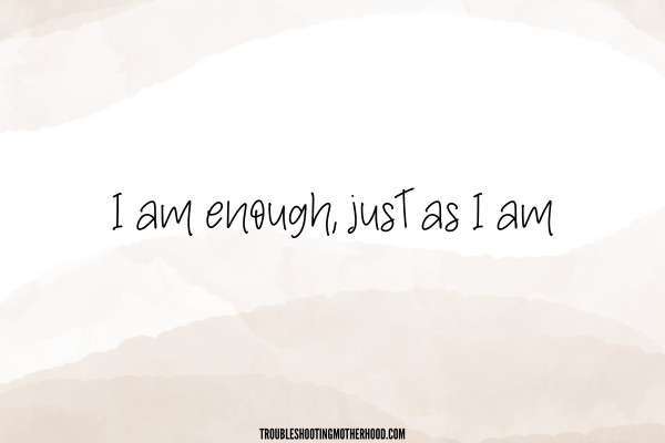 Neutral background. Text: I am enough, just as I am.