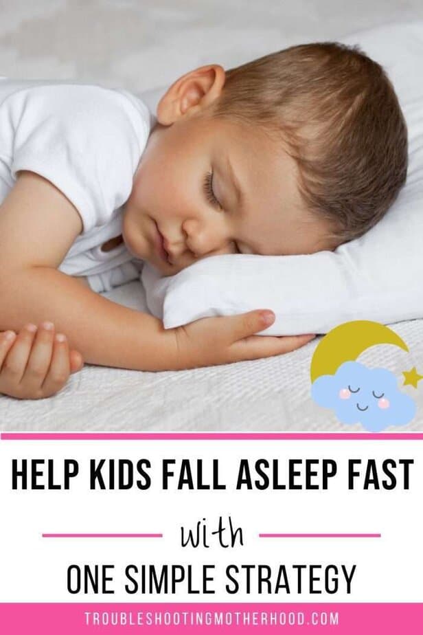 A peaceful toddler sleeps on a white bed with a small pillow, with overlaid text that reads “Help Kids Fall Asleep Fast with One Simple Strategy” in bold black and pink lettering. A smiling moon-and-cloud graphic is placed in the corner. easy bedtime strategy for parents. Parenting Toddlers. Toddler Sleep Tips.