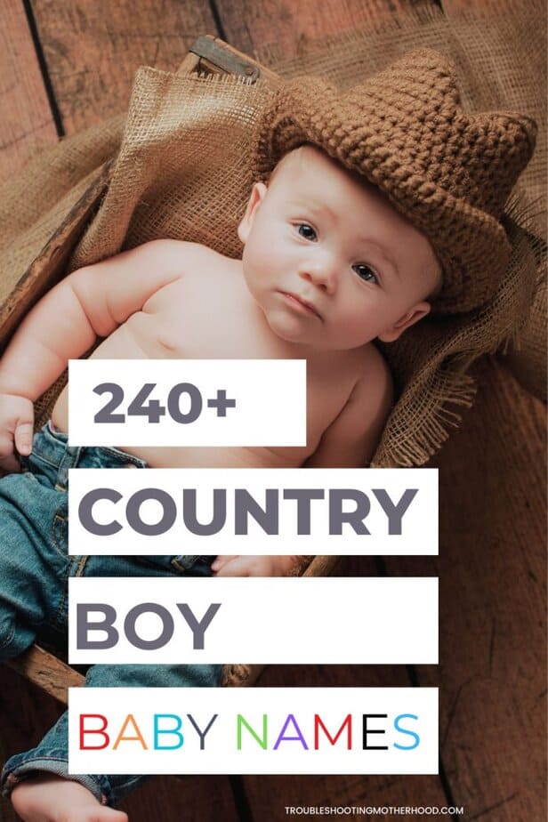 Baby boy wearing a crocheted brown cowboy hat and jeans, lying in a rustic wooden crate with burlap fabric, featuring text overlay that reads “240+ Country Boy Baby Names” 